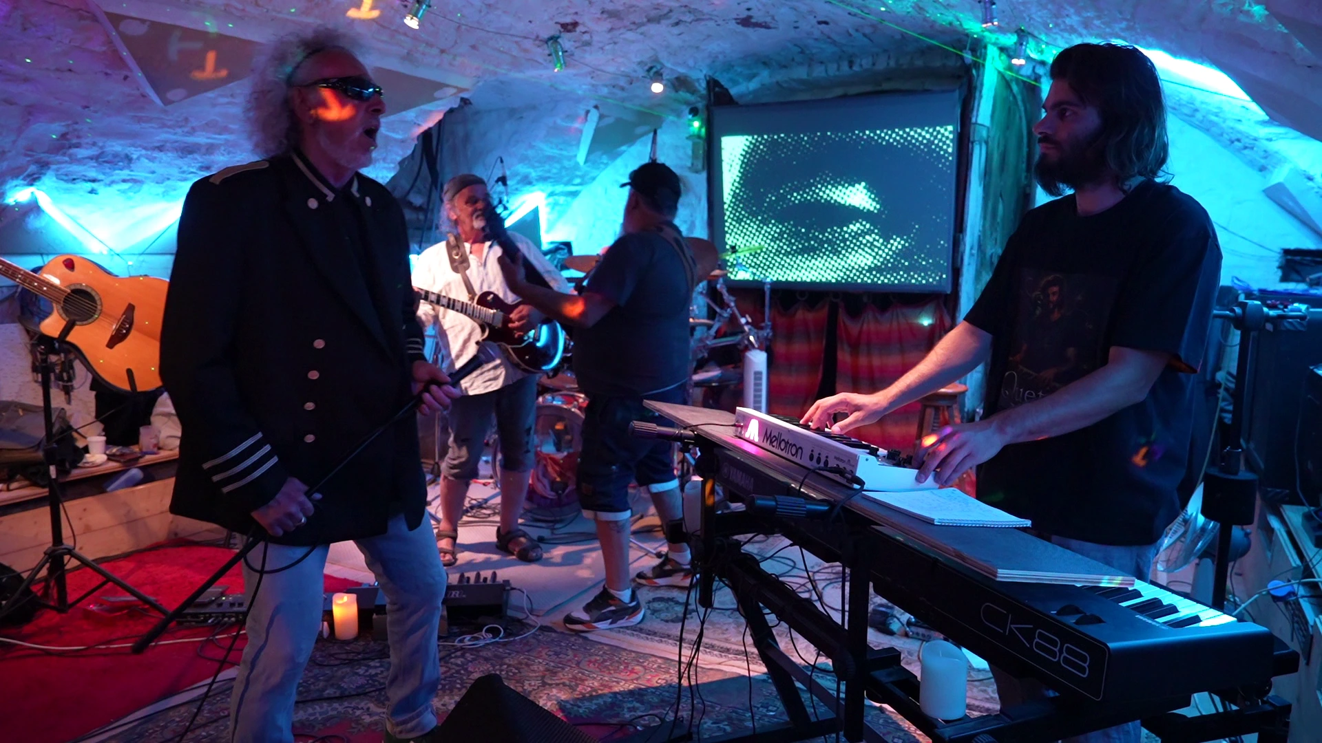 Quetzal performing live during a French progressive rock concert with symphonic keyboard textures